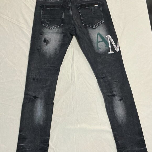 Black distressed Amiri animal skin jeans - Picture 2 of 9